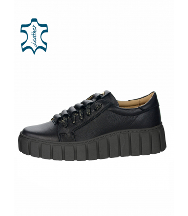 Black sneakers with a frill on the tongue on a black sole rosella8000