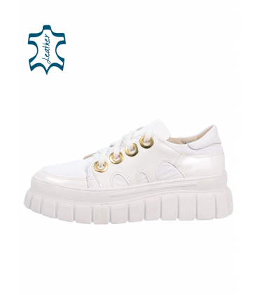 White shiny sneakers on zuma 7510 sole
