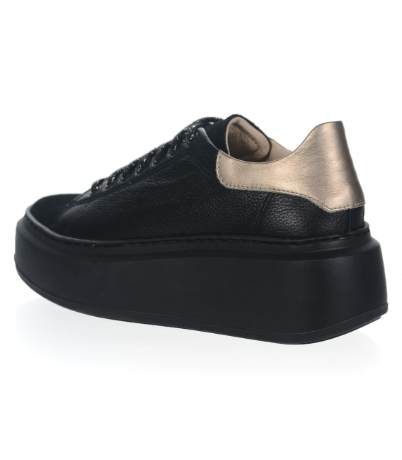 Black sneakers on a black sole with a gold heel n408s3