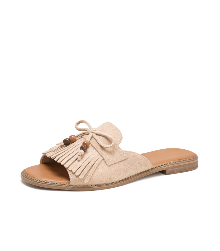 Comfortable beige summer slippers with tassel