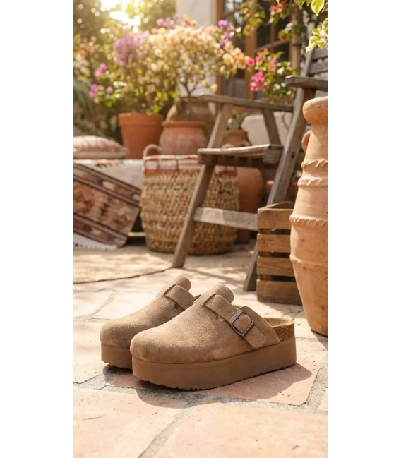 Women's closed cinnamon flip-flops with a higher sole