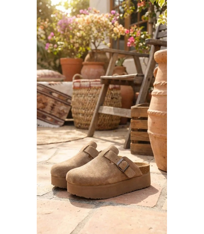 Women's closed cinnamon flip-flops with a higher sole