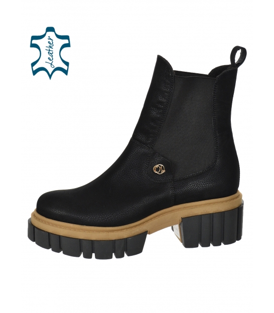 Black ankle boots on a brown sole 2302 