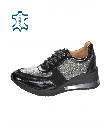Black-gray stylish sneakers with decorative applications on the Kamila sole DTE3304