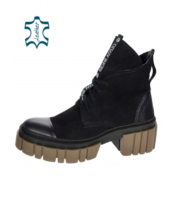 Black comfortable ankle boots with a decorative OL strap on a brown sole 3206 