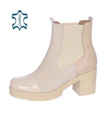 Bege ankle boots with stitching on a thick heel DKO2180