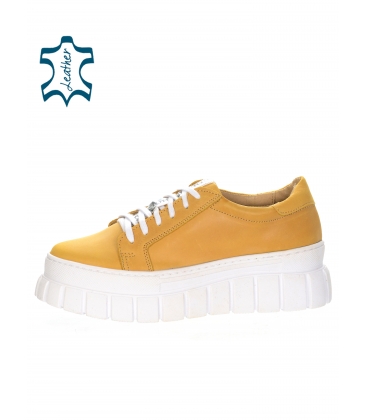 Yellow leather sneakers decorated with a silver strap on the sole ZUMA DTE3298