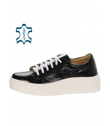 Black shiny leather sneakers decorated with silver OLIVIA strap on the sole Rosella DTE3298