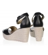 Black simple leather sandals on a decorated wedge heel 2339