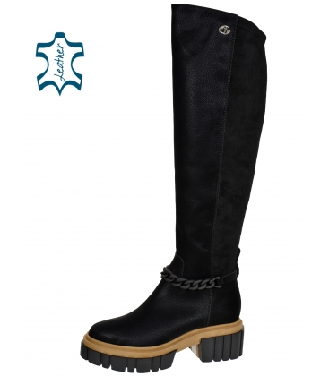 Black boots on a stylish brown-black sole with decoration 2306