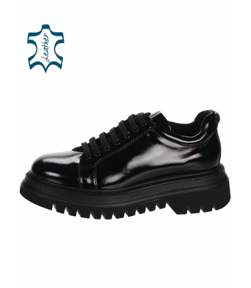 Black lacquered sneakers on a black sole 3170