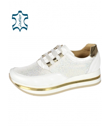 White and gold sneakers with glittering material on the sole karla DTE2118